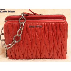 Kožená mini kabelka přes rameno Miu Miu Glazed Matelasse oranžová