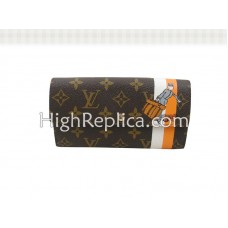 Peněženka Louis Vuitton Monogram Groom s kapsou na zip oranžová